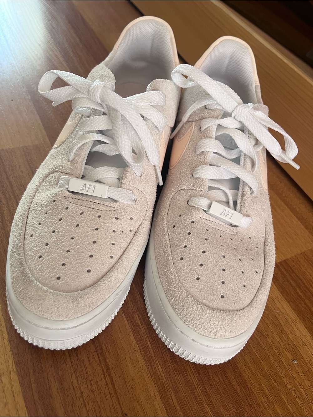 Nike Air Force 1 Women’s Low Suede Sneakers in Cream/White